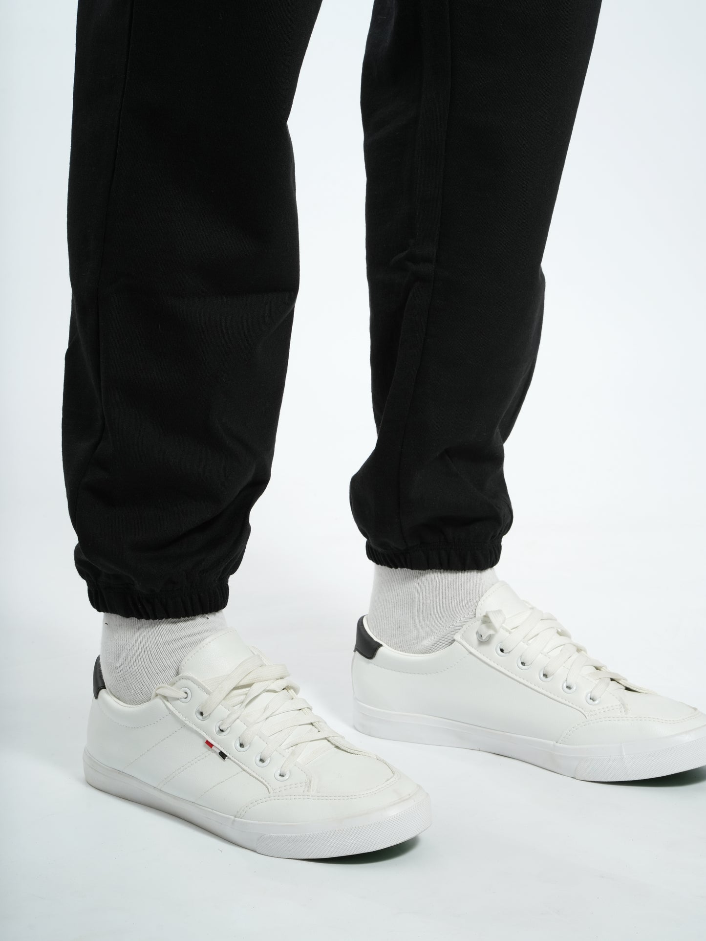 Unisex Signature Oversize Tapered Joggers Black with shoes